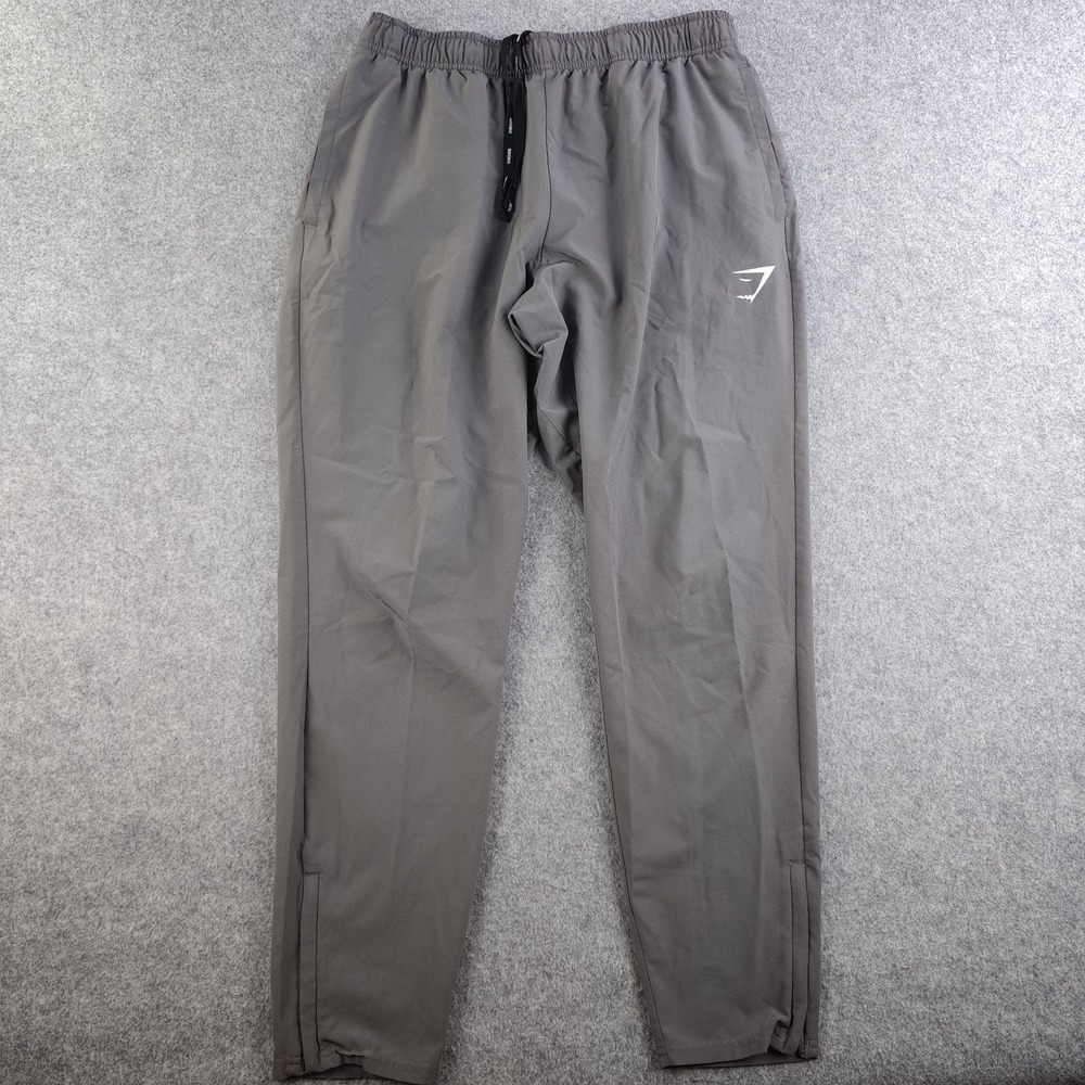 Gymshark Arrival Woven Joggers Mens Medium Silhouette Gray Zip Ankle Slim - Picture 1 of 13